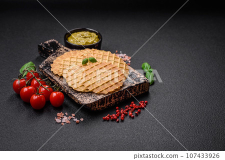 Round crispy wafers for making sweet delicious desserts or snacks 107433926