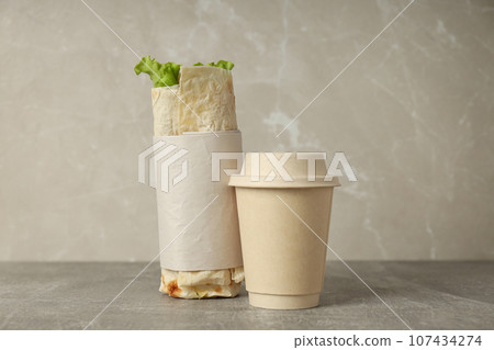 Tasty fast or homemade food concept - delicious shawarma Tasty fast or homemade food concept - delicious shawarma 107434274