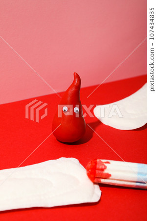 Menstrual pads with a three-dimensional red drop Menstrual pads with a three-dimensional red drop 107434835