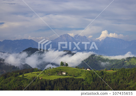 Landscape with St. Thomas Church (Cerkev Sveti Tomaz) near Skofja Loka, Slovenia Landscape with St. Thomas Church (Cerkev Sveti Tomaz) near Skofja Loka, Slovenia 107435655