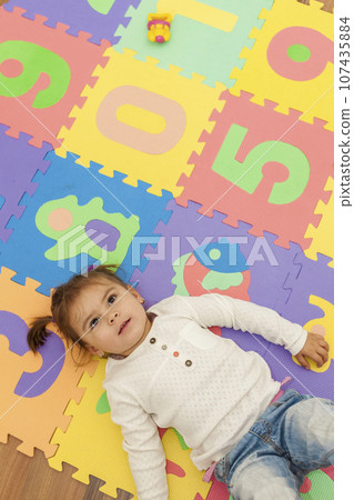 girl in kids room, Czech Republic 107435884