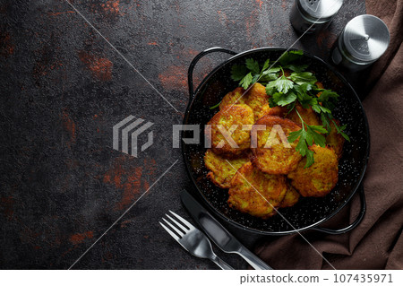 Lunch tasty food concept - delicious hash browns Lunch tasty food concept - delicious hash browns 107435971