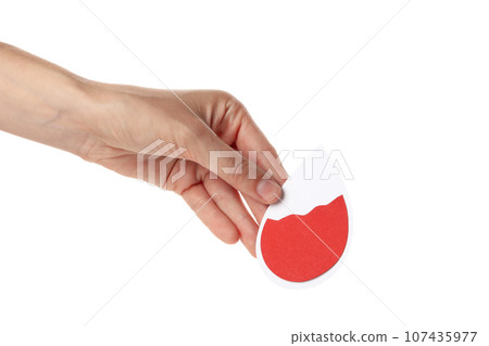 PNG,a paper drop of blood in the hand. Blood donation,isolated on white background 107435977