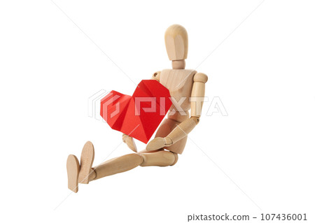 PNG, paper heart in the hands of a wooden doll. Blood donation, isolated on white background 107436001