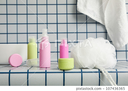 A shelf in the bathroom with care products. A shelf in the bathroom with care products. 107436365