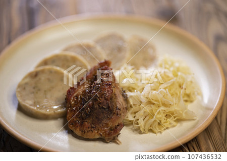 pork meat with sauerkraut and carlsbad dumplings 107436532
