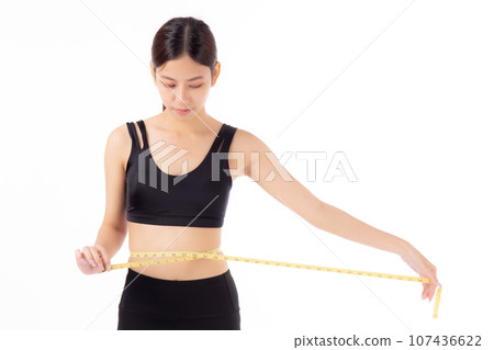 Portrait beautiful young asian woman measure tape with waist for weightloss with satisfied. 107436622
