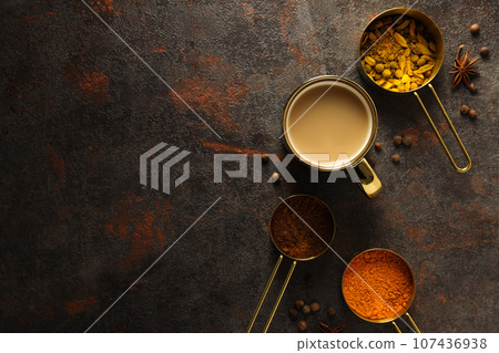 Traditional Indian hot drink with milk and spices - Masala tea Traditional Indian hot drink with milk and spices - Masala tea 107436938