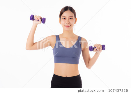 Portrait beautiful young asian woman lifting dumbbell isolated on white background. 107437226