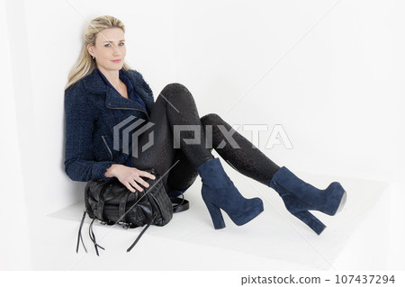 Stylish woman wearing fashionable boots 107437294