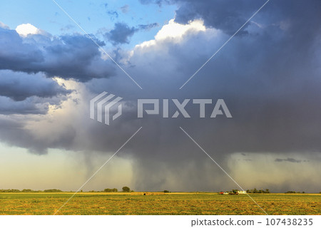 Stormy sky due to rain in the Argentine countryside, La Pampa province, Patagonia, Argentina. Stormy sky due to rain in the Argentine countryside, La Pampa province, Patagonia, Argentina. 107438235