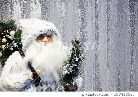 Happy Santa Claus Doll on Christmas time.colorful bokeh background 107438553