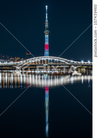 Tokyo Skytree seen from Shioiri Park in Tokyo, special illumination in the image of the Japanese flag Tokyo Skytree seen from Shioiri Park in Tokyo, special illumination in the image of the Japanese flag 107439460