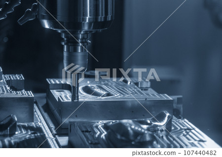 The CNC milling machine rough cutting the injection mold parts by indexable tools. 107440482