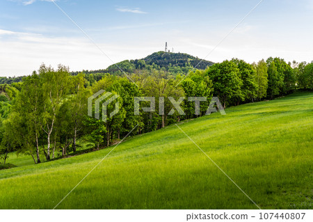 Jedlova Mountain in greenery of Lusatian Mountains, Czech Republic Jedlova Mountain in greenery of Lusatian Mountains, Czech Republic 107440807