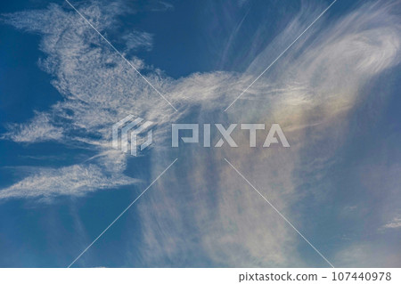 Muscular clouds and deformed scale clouds waving in the autumn evening Muscular clouds and deformed scale clouds waving in the autumn evening 107440978