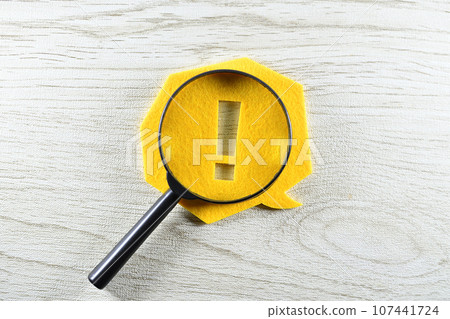 exclamation mark and magnifying glass exclamation mark and magnifying glass 107441724