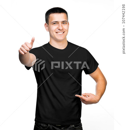 attractive man in black t-shirt with thumbs up 107442198