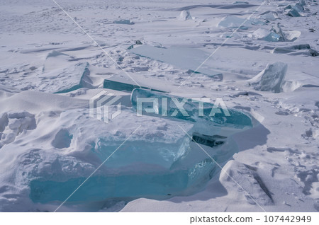 On the ice of Lake Baikal. beautiful pieces of ice. Ice hummock on the ice of lake Baikal 107442949