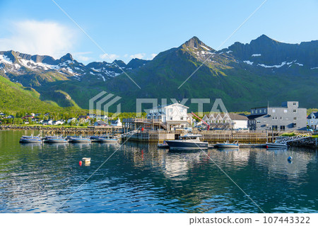 Fishing base in village Mefjordvaer, island Senja, Norway, Mefjord Brygge. Fishing village in summer 107443322