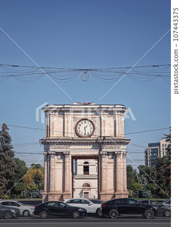 Triumphal Arch in Chisinau the capital Moldova. View to the landmark from the street Triumphal Arch in Chisinau the capital Moldova. View to the landmark from the street 107443375