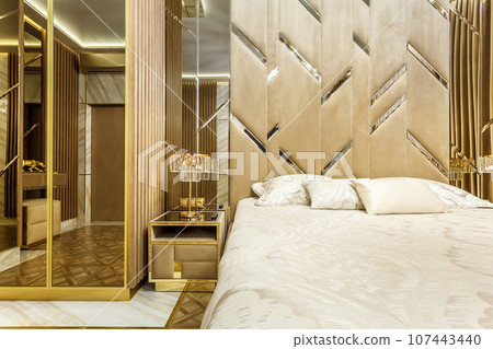 Luxury bedroom interior with parquet and mirror walls Luxury bedroom interior with parquet and mirror walls 107443440