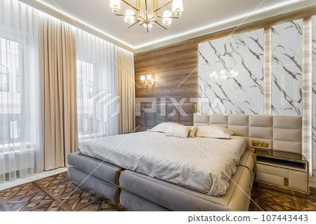 Luxury bedroom interior with parquet and wood marble walls 107443443