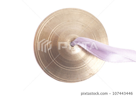 Hand cymbals top view isolated on white background. 107443446