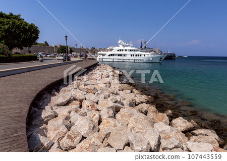 City embankment near the seaport on the island of Rhodes. City embankment near the seaport on the island of Rhodes. 107443559