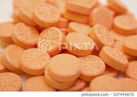 Many tablets and orange vitamin - protection during quarantine, coronavirus, covid19 107443678