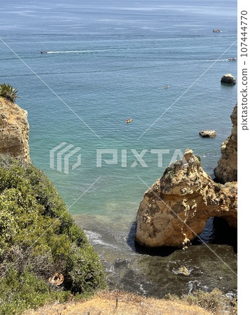 Rocks and sandy beach in Portugal, Lagos Rocks and sandy beach in Portugal, Lagos 107444770
