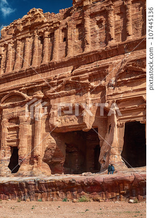View of the temple and building carved into the sandstone rock. Petra, Jordan. 107445136