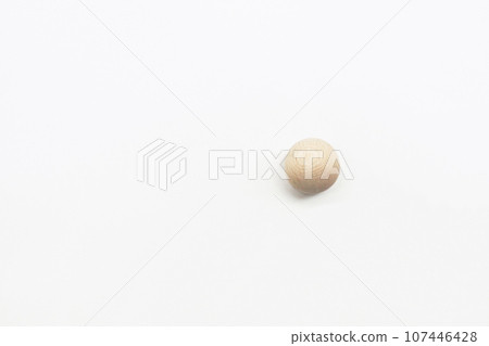One wooden sphere with visible wood grain One wooden sphere with visible wood grain 107446428