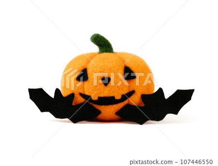 Halloween wool pumpkin with a bat isolated on a white background. Woolen felting toys Jack o lantern pumpkin head and bat. Halloween wool pumpkin with a bat isolated on a white background. Woolen felting toys Jack o lantern pumpkin head and bat. 107446550