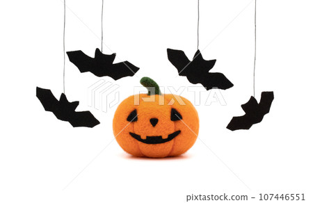 Halloween toy pumpkin and bats made of wool. Felted Halloween pumpkin. Jack o lantern pumpkin head and bat isolated on white background. Halloween toy pumpkin and bats made of wool. Felted Halloween pumpkin. Jack o lantern pumpkin head and bat isolated on white background. 107446551