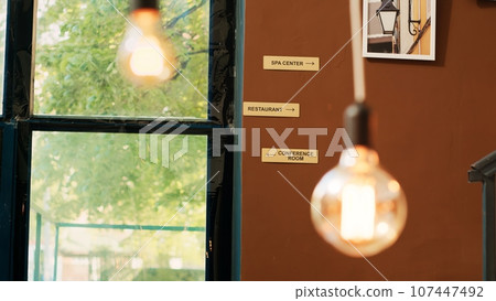 Classy decorations in hotel lobby, elegant luxury resort with interior design and empty lounge area. Luxurious expensive furniture in front desk reception entrance. Handheld shot. Classy decorations in hotel lobby, elegant luxury resort with interior design and empty lounge area. Luxurious expensive furniture in front desk reception entrance. Handheld shot. 107447492
