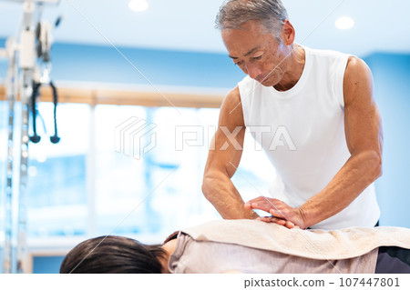 Sports massage gym stretching 107447801