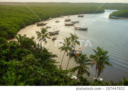 panoramic view of tourists boats on sea channel in Santa Cruz Cabralia, Bahia State, Brazil panoramic view of tourists boats on sea channel in Santa Cruz Cabralia, Bahia State, Brazil 107447852