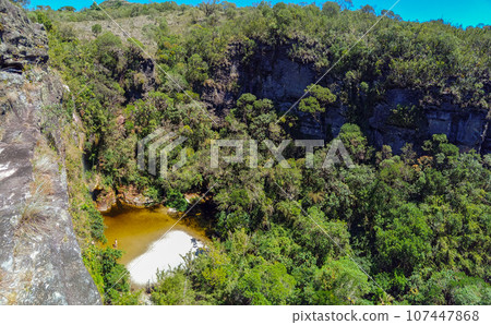 beautiful waterfall in the Ibitipoca State park valley, Minas Gerais, Brazil 107447868