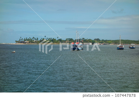 passenger boats anchored in the bay of Porto Seguro, Bahia, Brazil 107447878