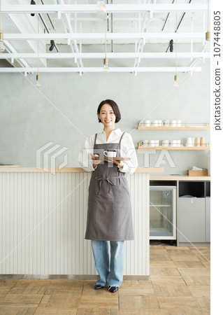 cafe clerk with coffee cafe clerk with coffee 107448805