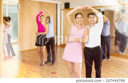 young women with partner dance samba 107449766