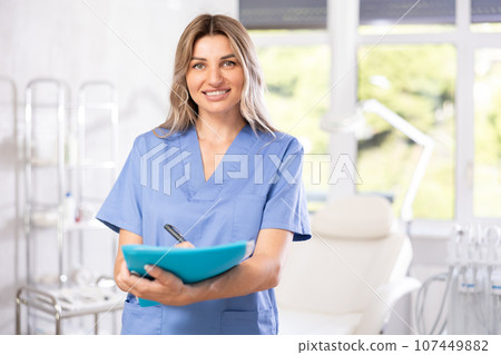skilled cosmetologist stands skilled cosmetologist stands 107449882