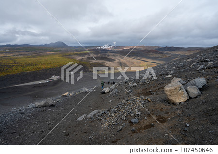 Hikers on trail to rim of Hverfjall crater east of Myvatn, Iceland. Hikers on trail to rim of Hverfjall crater east of Myvatn, Iceland. 107450646