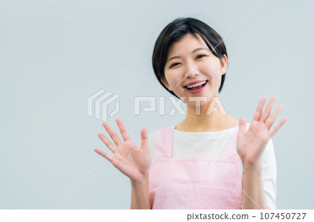 Young woman working at a care house Young woman working at a care house 107450727