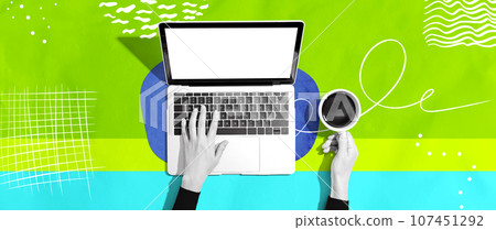 Person using a laptop computer 107451292