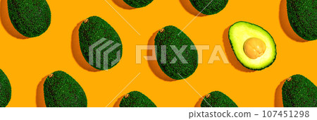 Fresh avocado pattern overhead view 107451298
