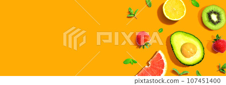 Avocado and mixed fruits overhead view 107451400