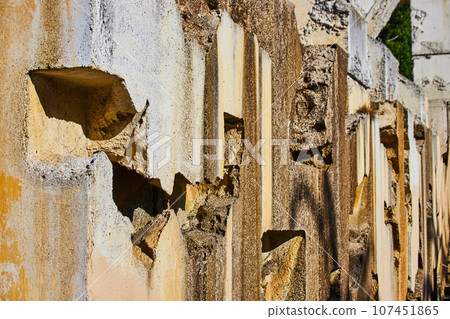 Textured concrete wall of varying hues in color abstract background asset Textured concrete wall of varying hues in color abstract background asset 107451865