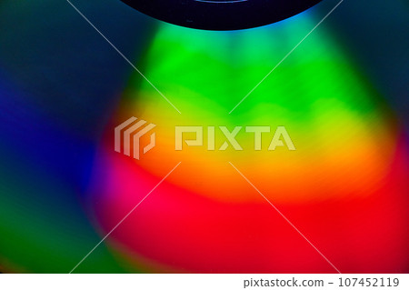 Curving rainbow colored light on dark background asset Curving rainbow colored light on dark background asset 107452119